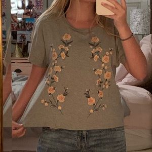 grey shirt w/ floral details